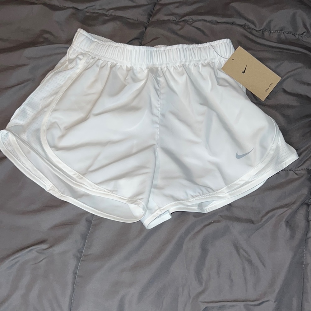 White Nike shorts